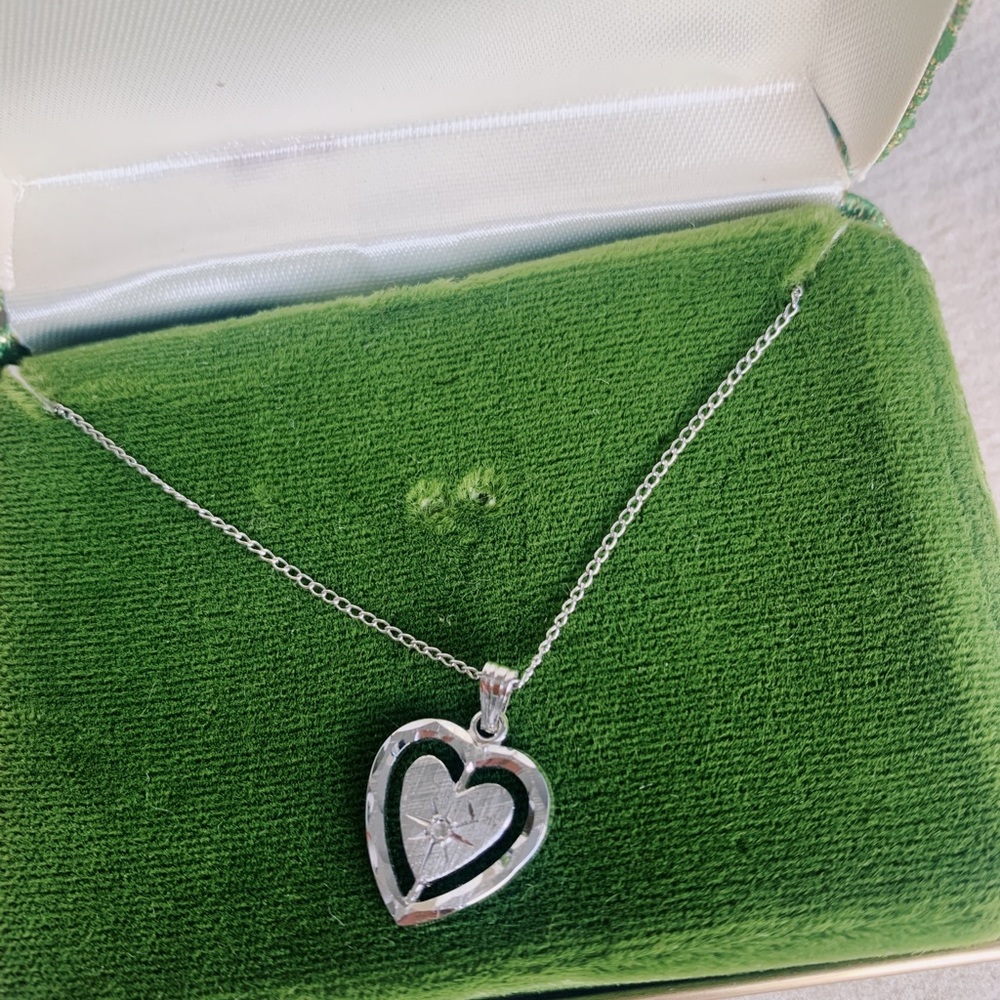 Vintage diamond sterling silver heart necklace.